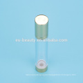 shiny gold aluminum airless bottle with logo debossed aluminum cap